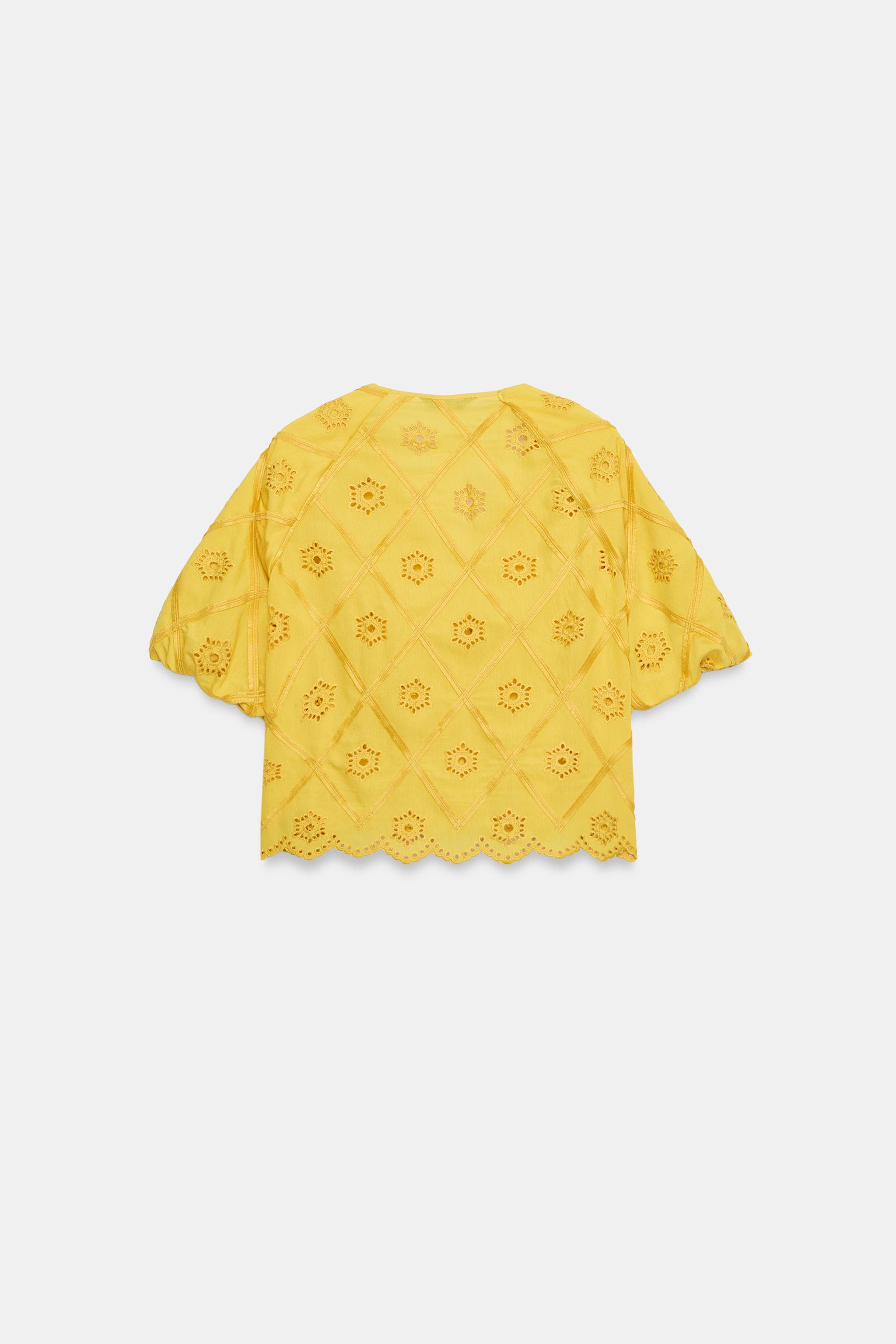 EMBROIDERED EYELET TOP